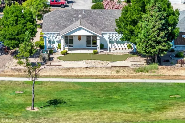 a view of a house with a swimming pool
