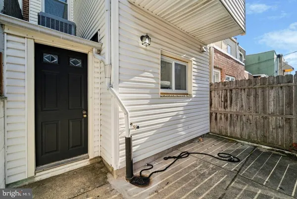 a view of a wooden door of a house