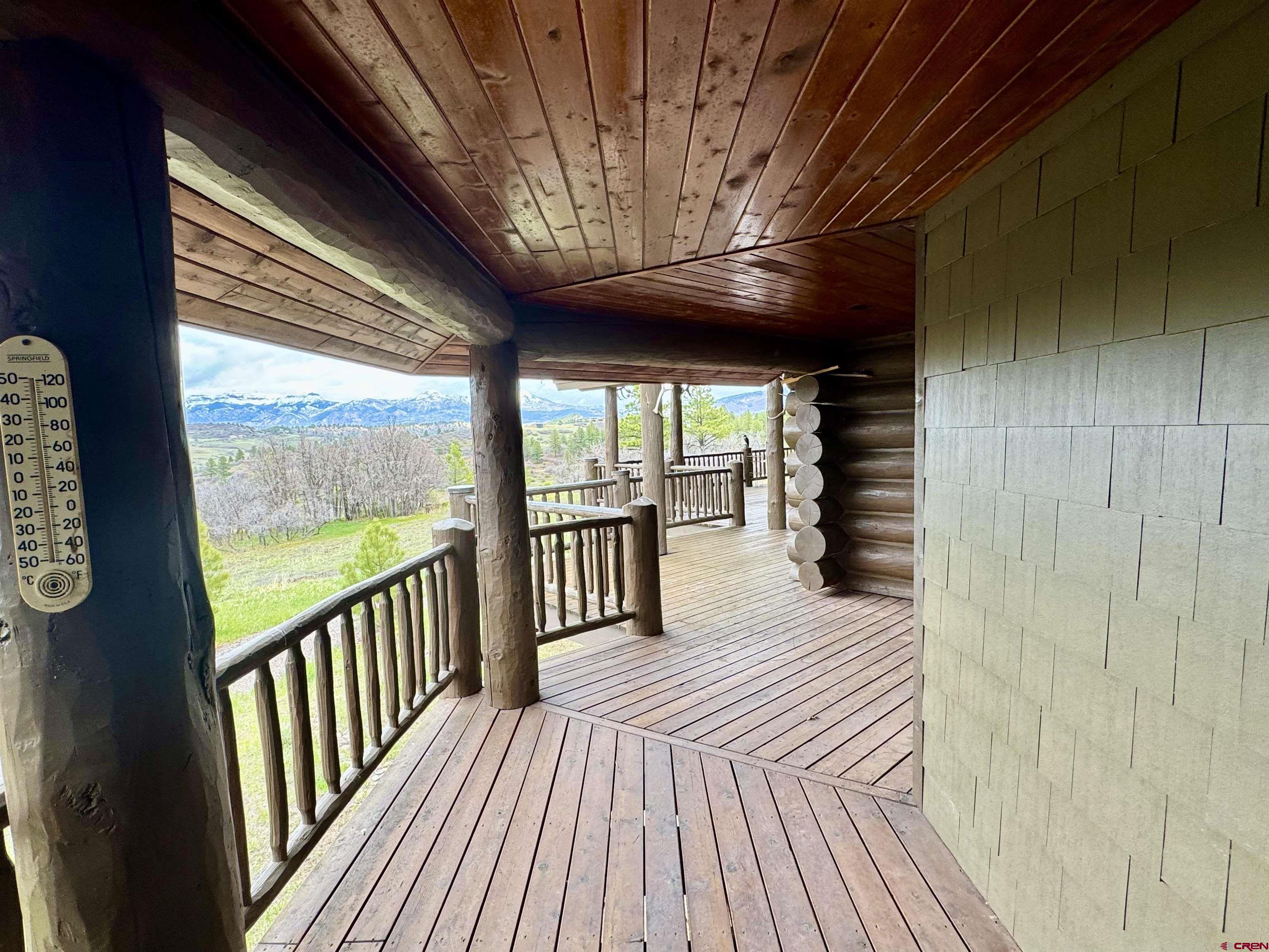 1329 B Spg Vly Rnch Road, Unit ELK HAVEN Chromo, CO 81128 - Photo 29 of 33 a view of a room with wooden floor and iron stairs