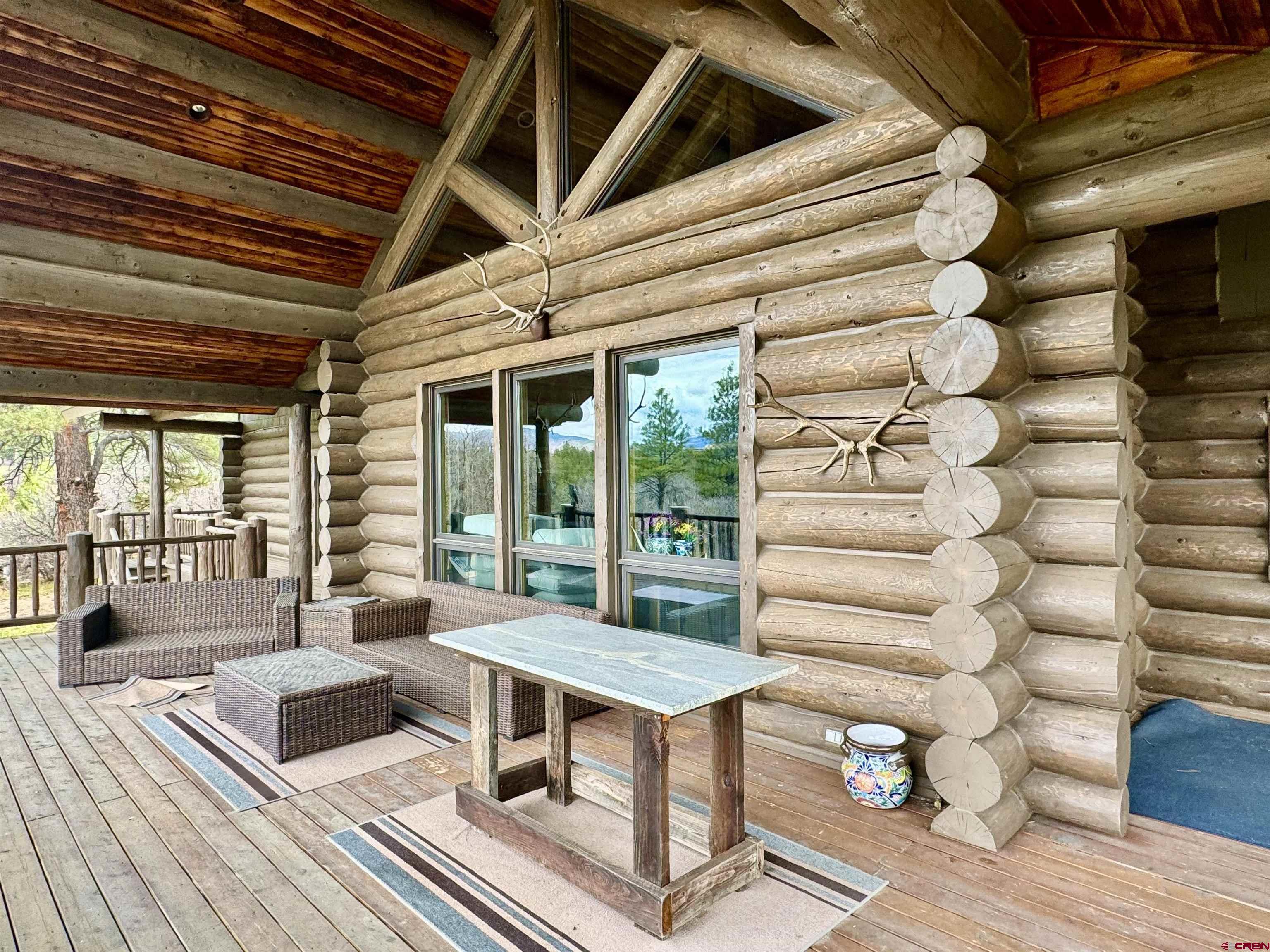 1329 B Spg Vly Rnch Road, Unit ELK HAVEN Chromo, CO 81128 - Photo 30 of 33 a living room with furniture and wooden floor