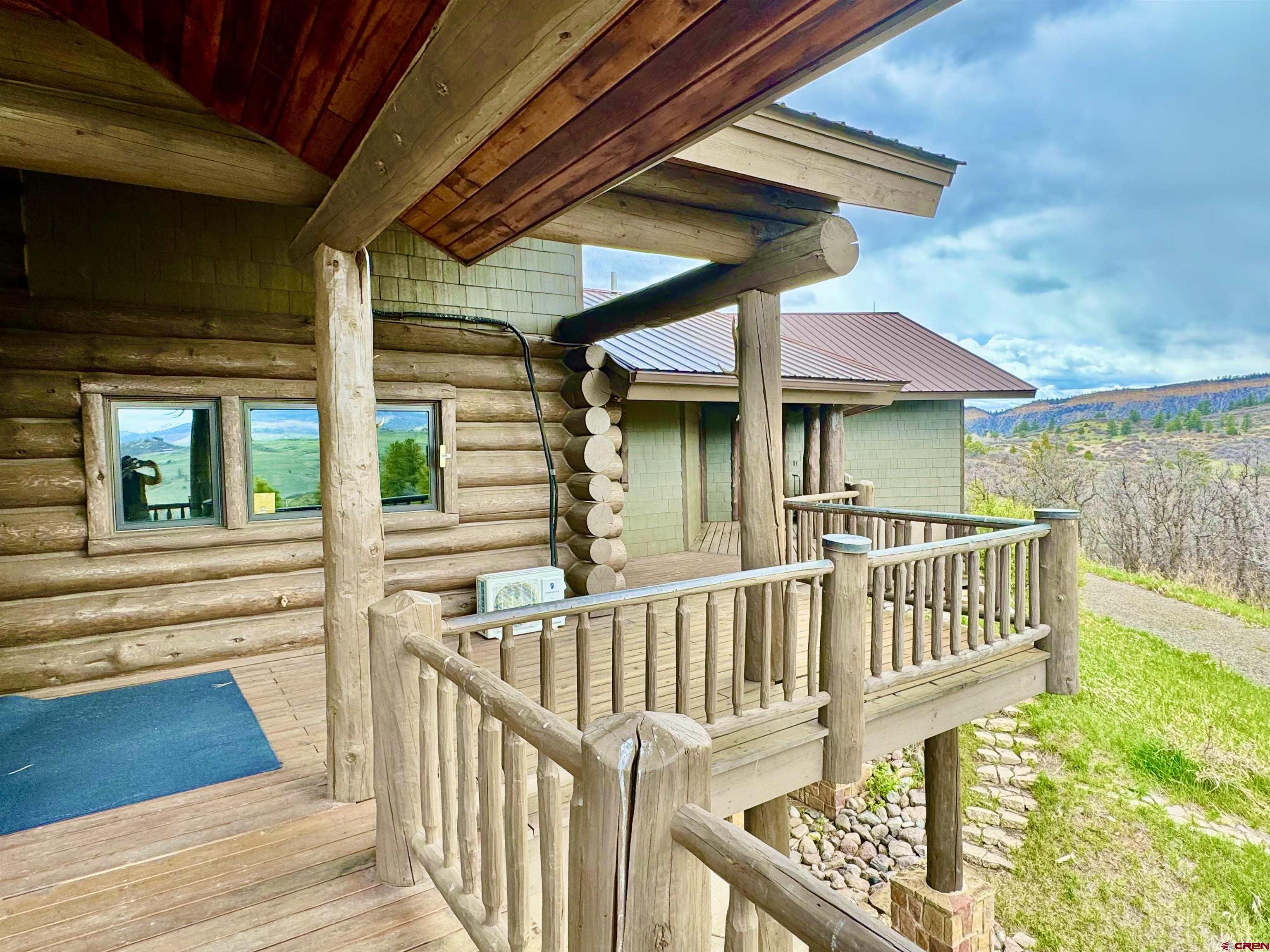 1329 B Spg Vly Rnch Road, Unit ELK HAVEN Chromo, CO 81128 - Photo 31 of 33 a view of a balcony with a deck