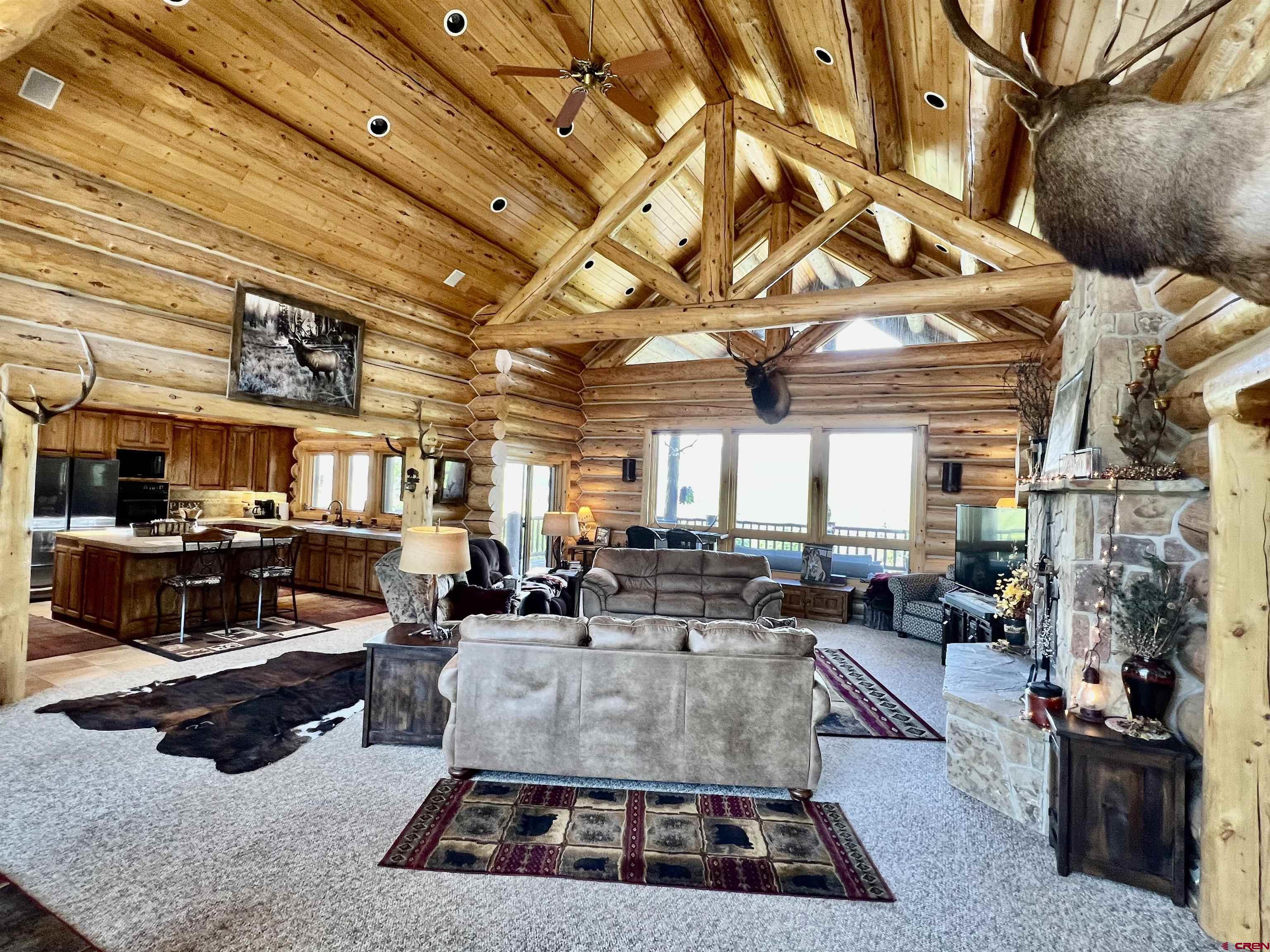 1329 B Spg Vly Rnch Road, Unit ELK HAVEN Chromo, CO 81128 - Photo 10 of 33 a living room with lots of furniture and kitchen view