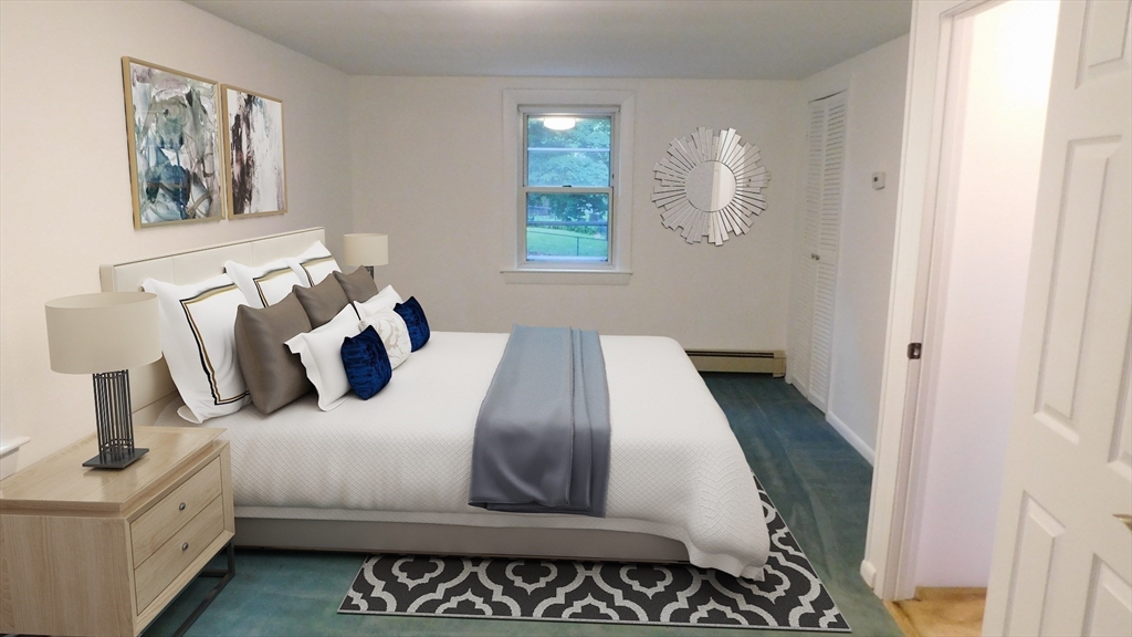 414 Cedar Street Dedham, MA 02026 - Photo 21 of 24 a bedroom with bed and cupboard