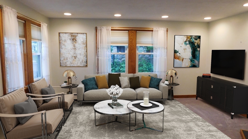 414 Cedar Street Dedham, MA 02026 - Photo 9 of 24 a living room with furniture and a flat screen tv