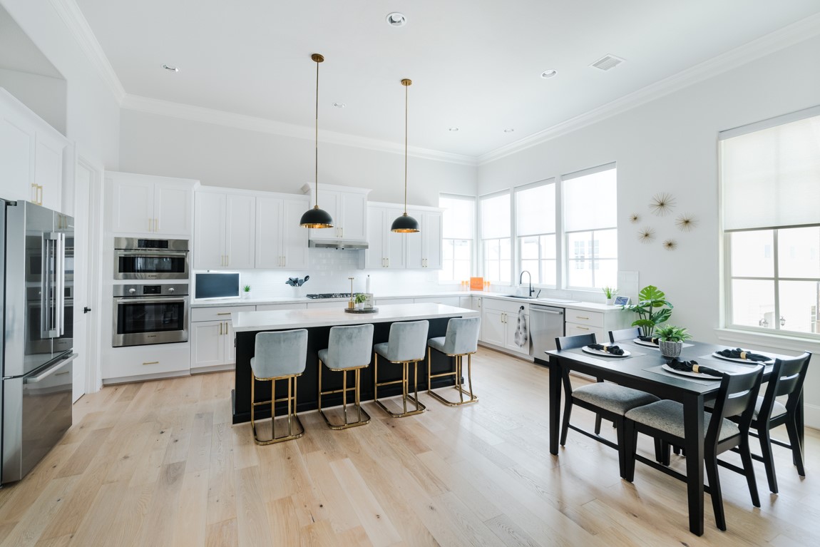 soaring 12ft ceilings and huge windows that let in all the natural light in this beautiful corner unit similar to this home