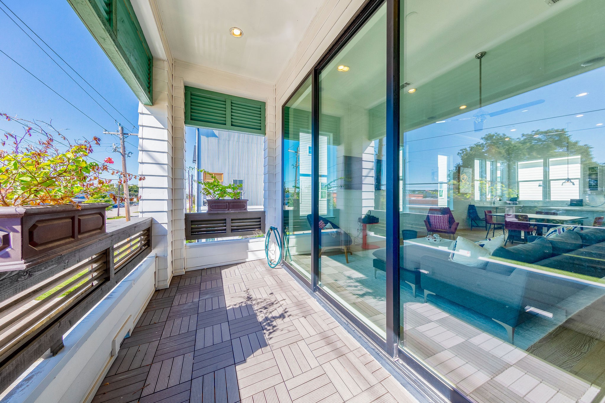 3317 Green Lilly Lane Houston, TX 77008 - Photo 3 of 9 deep oversized balcony with gas /water line and 10ft glass sliding trifold doors