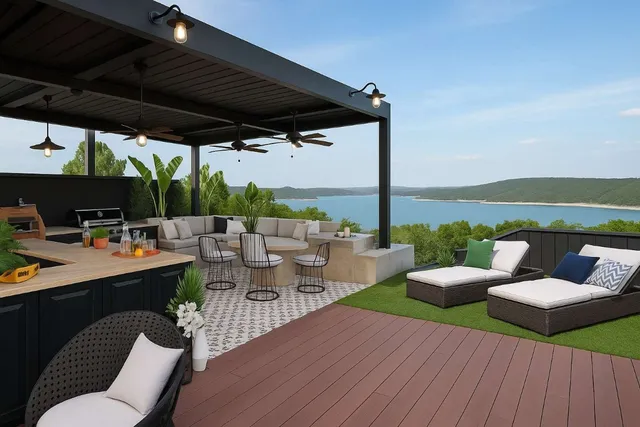 an aerial view of a residential houses with outdoor space and lake view