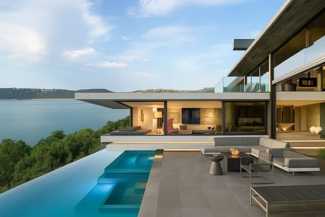 a view of a lake with houses in the back