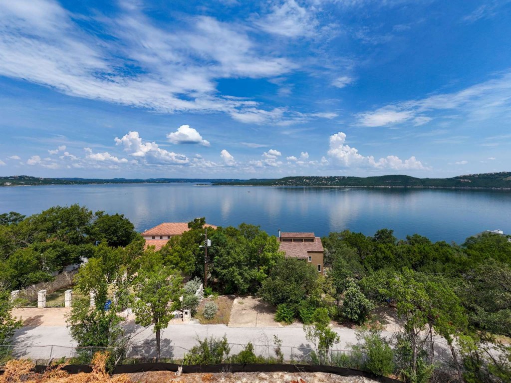5006 Marshall Ford Road Austin, TX 78732 - Photo 31 of 40 an aerial view of a residential houses with outdoor space and lake view