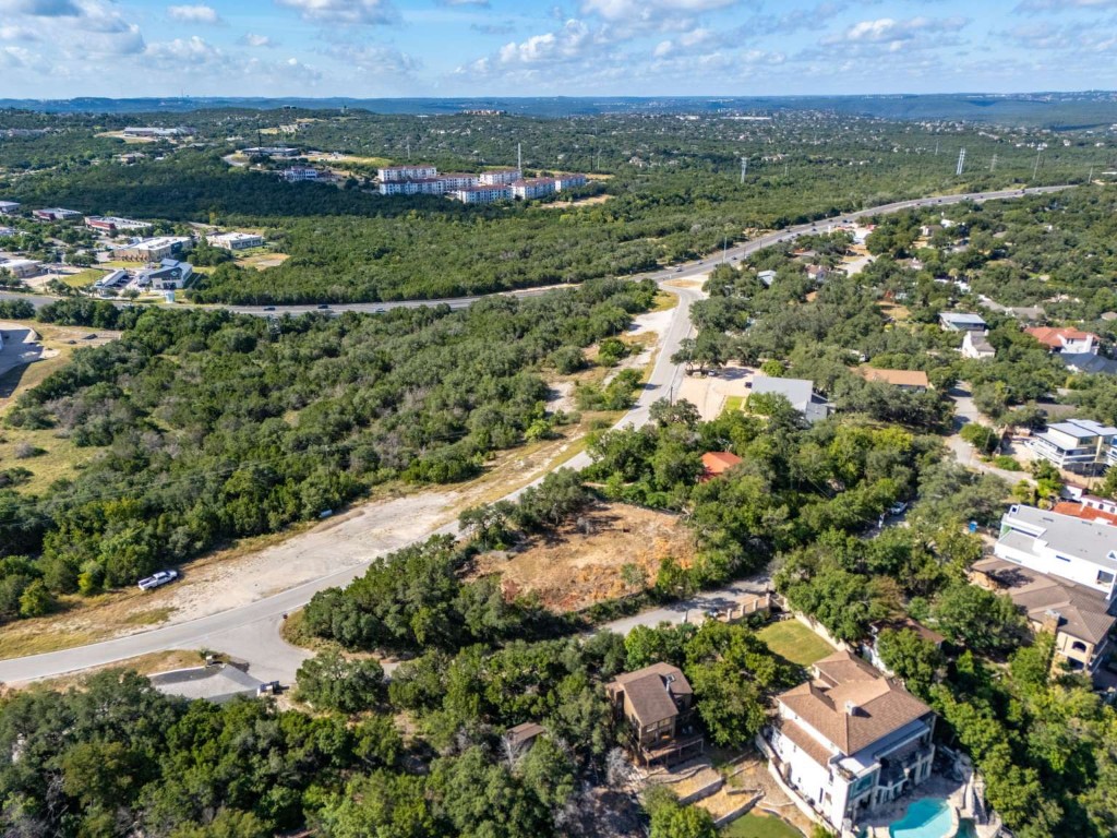 5006 Marshall Ford Road Austin, TX 78732 - Photo 36 of 40 an aerial view of a residential houses with outdoor space and lake view