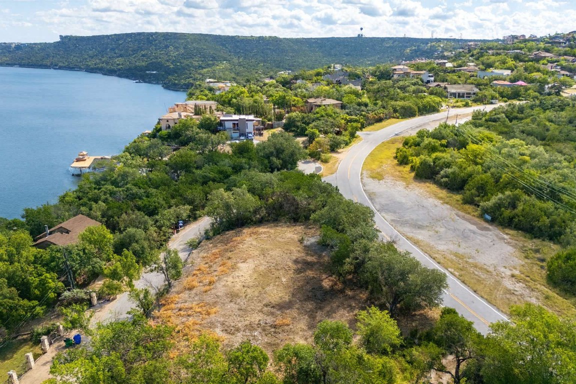 5006 Marshall Ford Road Austin, TX 78732 - Photo 6 of 40 a view of a lake with a garden