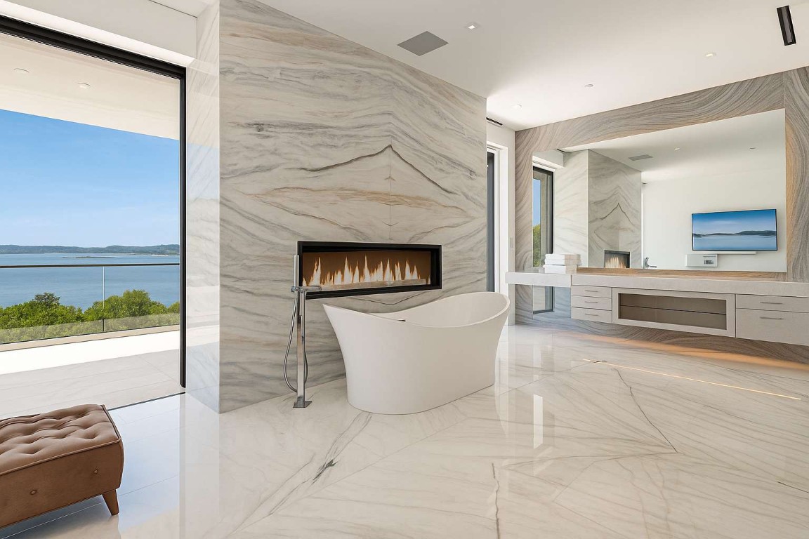 5006 Marshall Ford Road Austin, TX 78732 - Photo 9 of 40 a living room with a couch and a fireplace