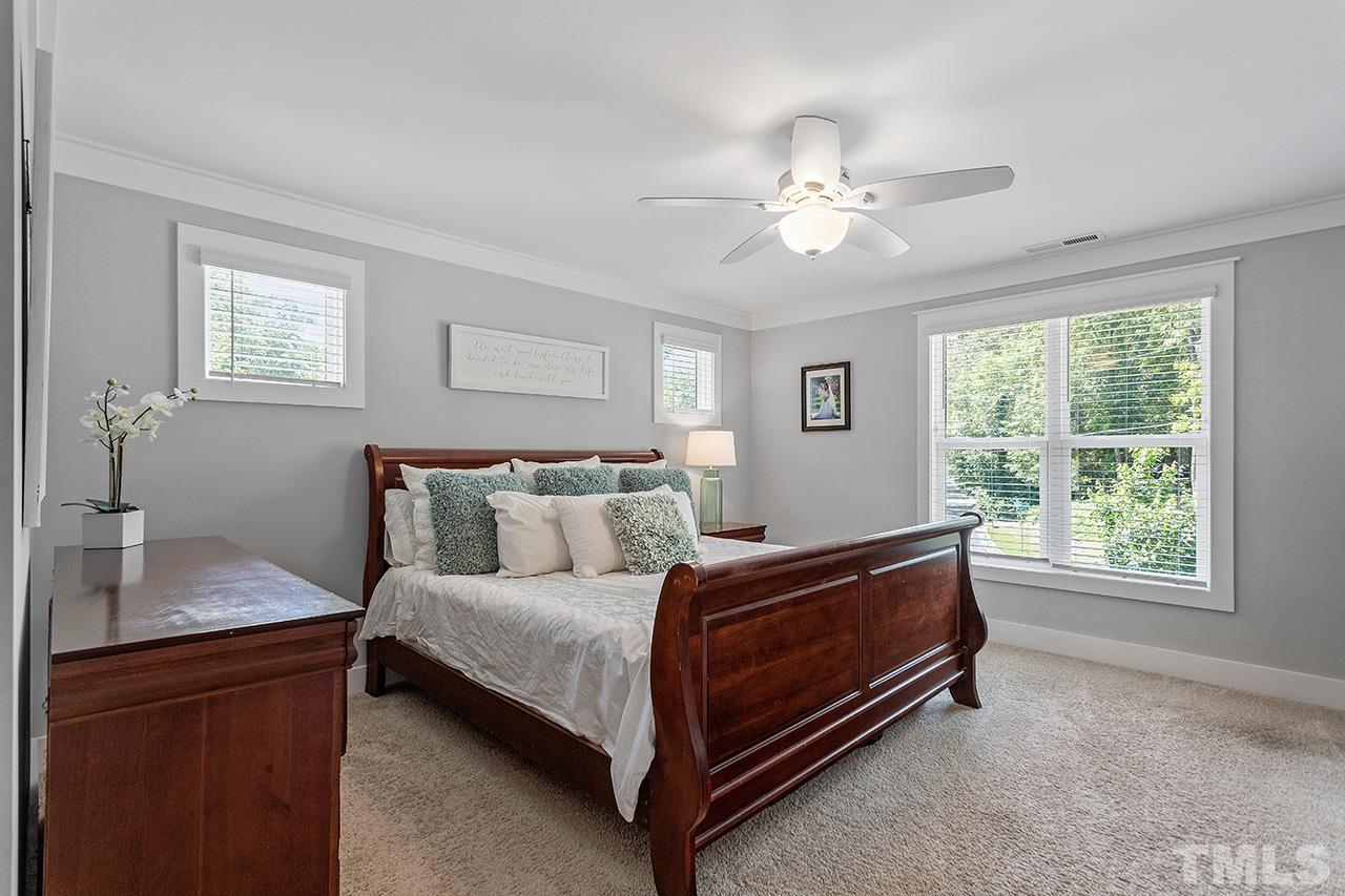 1417 Battery Drive Raleigh, NC 27610 - Photo 19 of 34 a bed room with a bed and a window
