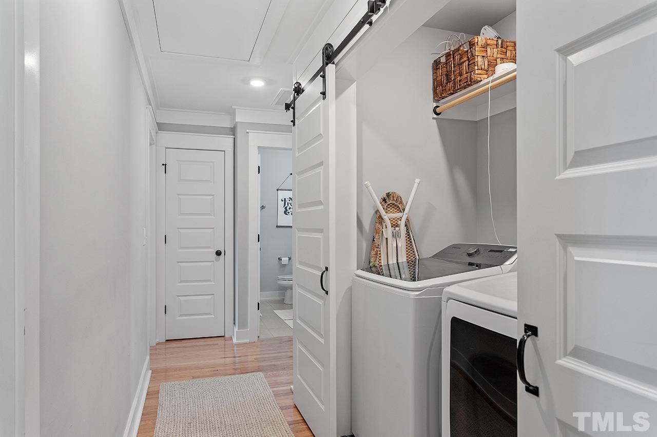 1417 Battery Drive Raleigh, NC 27610 - Photo 23 of 34 a bathroom with a sink and mirror