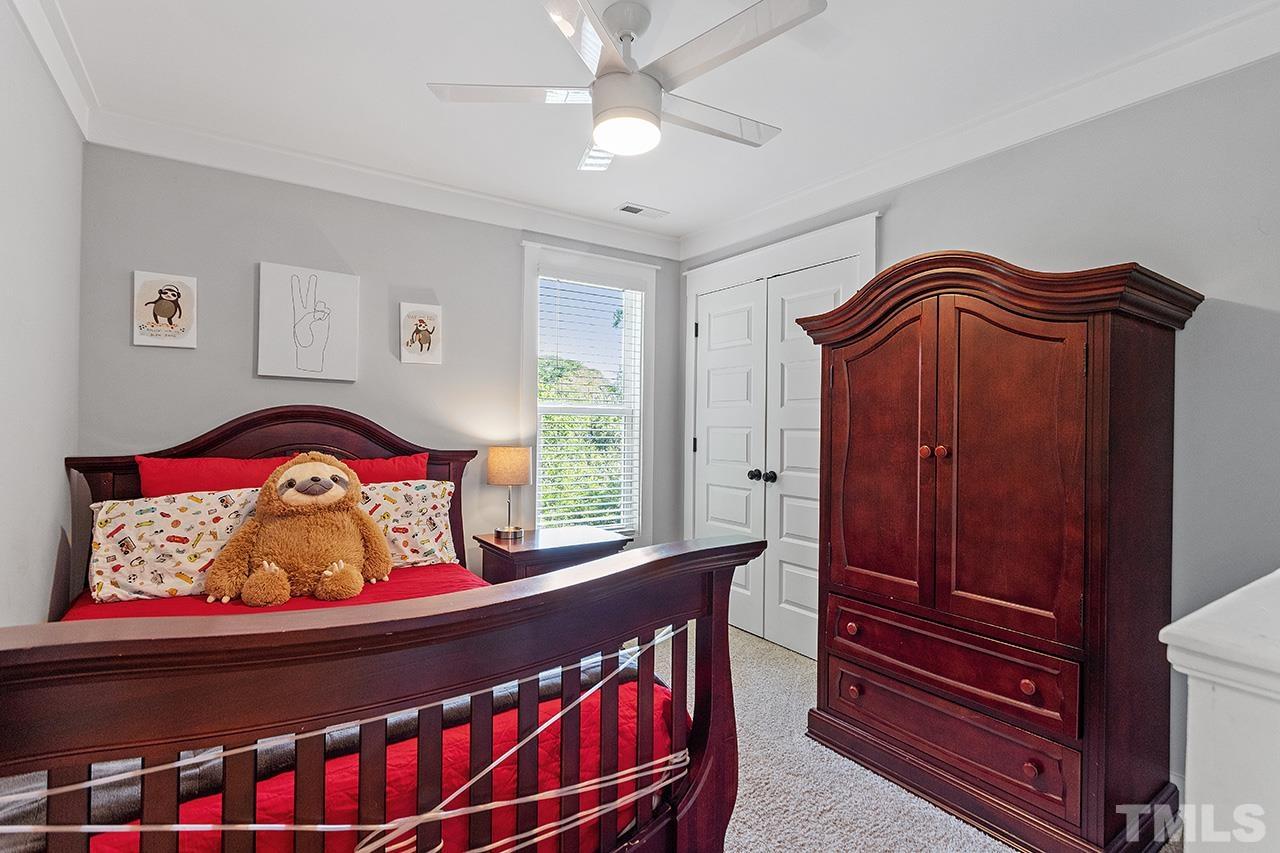 1417 Battery Drive Raleigh, NC 27610 - Photo 24 of 34 a view of bedroom with furniture and a window