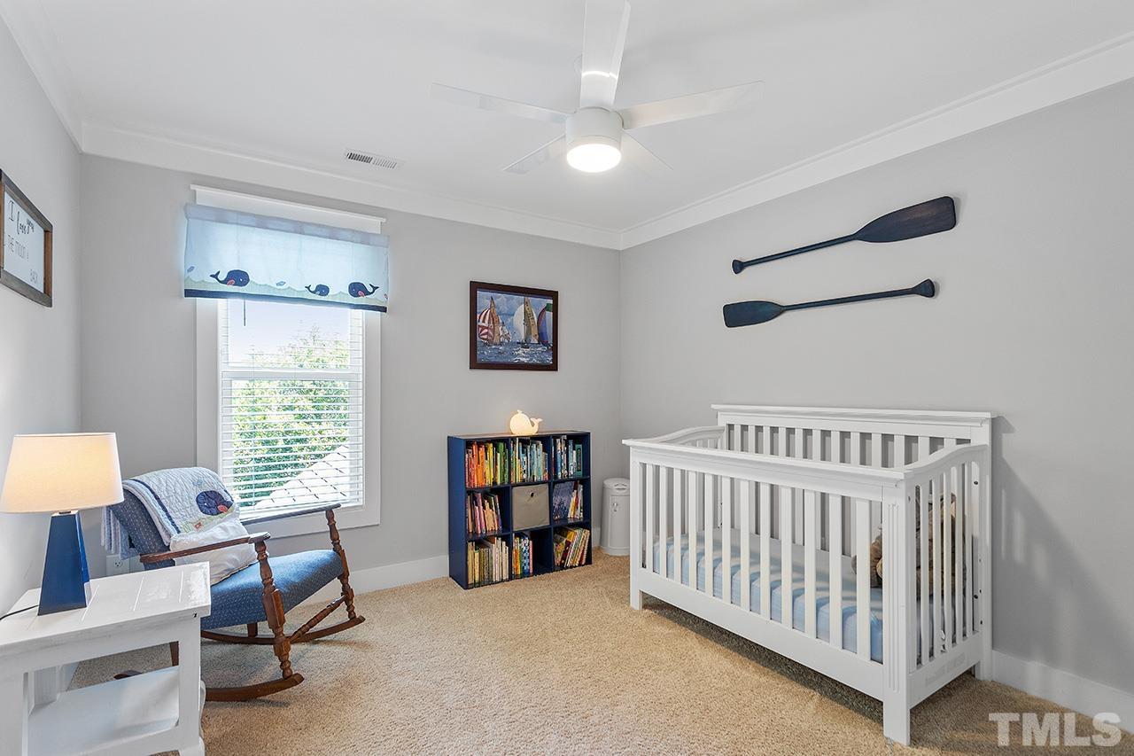 1417 Battery Drive Raleigh, NC 27610 - Photo 25 of 34 a bedroom with furniture and a window