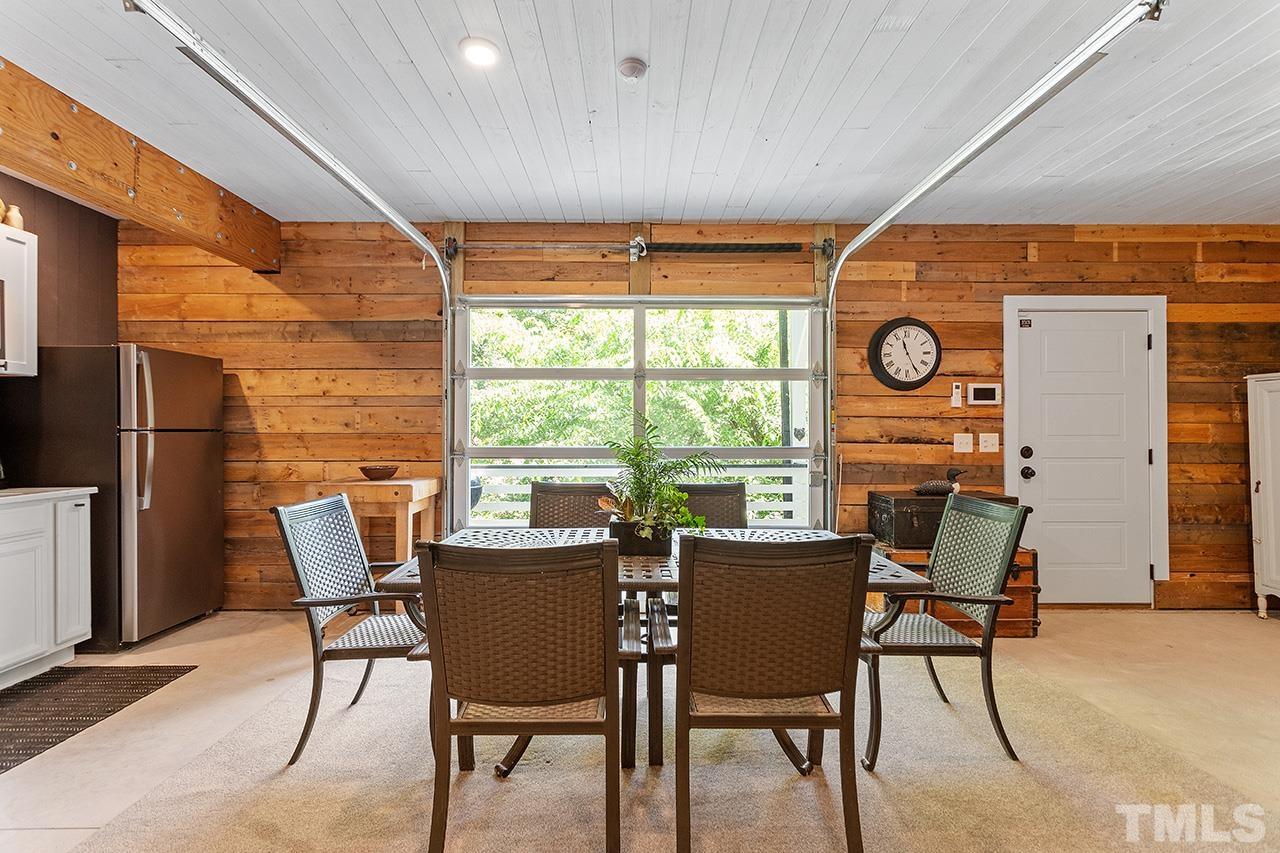 1417 Battery Drive Raleigh, NC 27610 - Photo 28 of 34 a view of a dining room with furniture and a window
