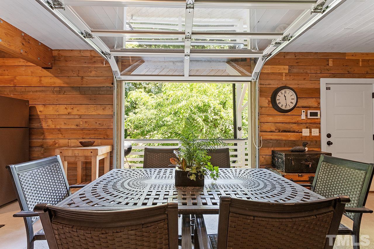 1417 Battery Drive Raleigh, NC 27610 - Photo 31 of 34 a view of a dining room with furniture window and outside view