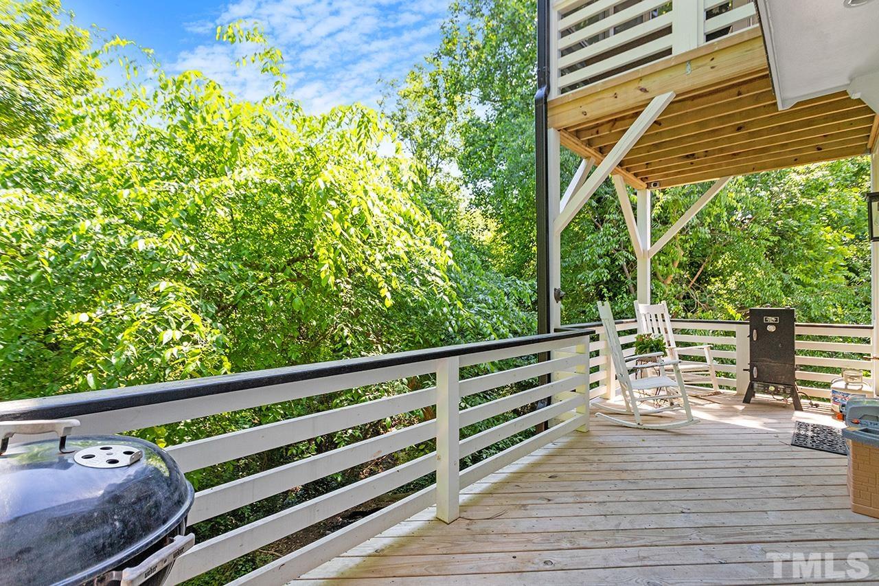 1417 Battery Drive Raleigh, NC 27610 - Photo 34 of 34 a view of a deck with wooden floor and fence