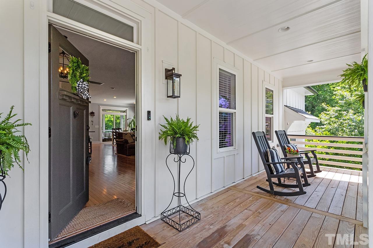 1417 Battery Drive Raleigh, NC 27610 - Photo 5 of 34 a view of a dinning room with furniture and floor to ceiling window