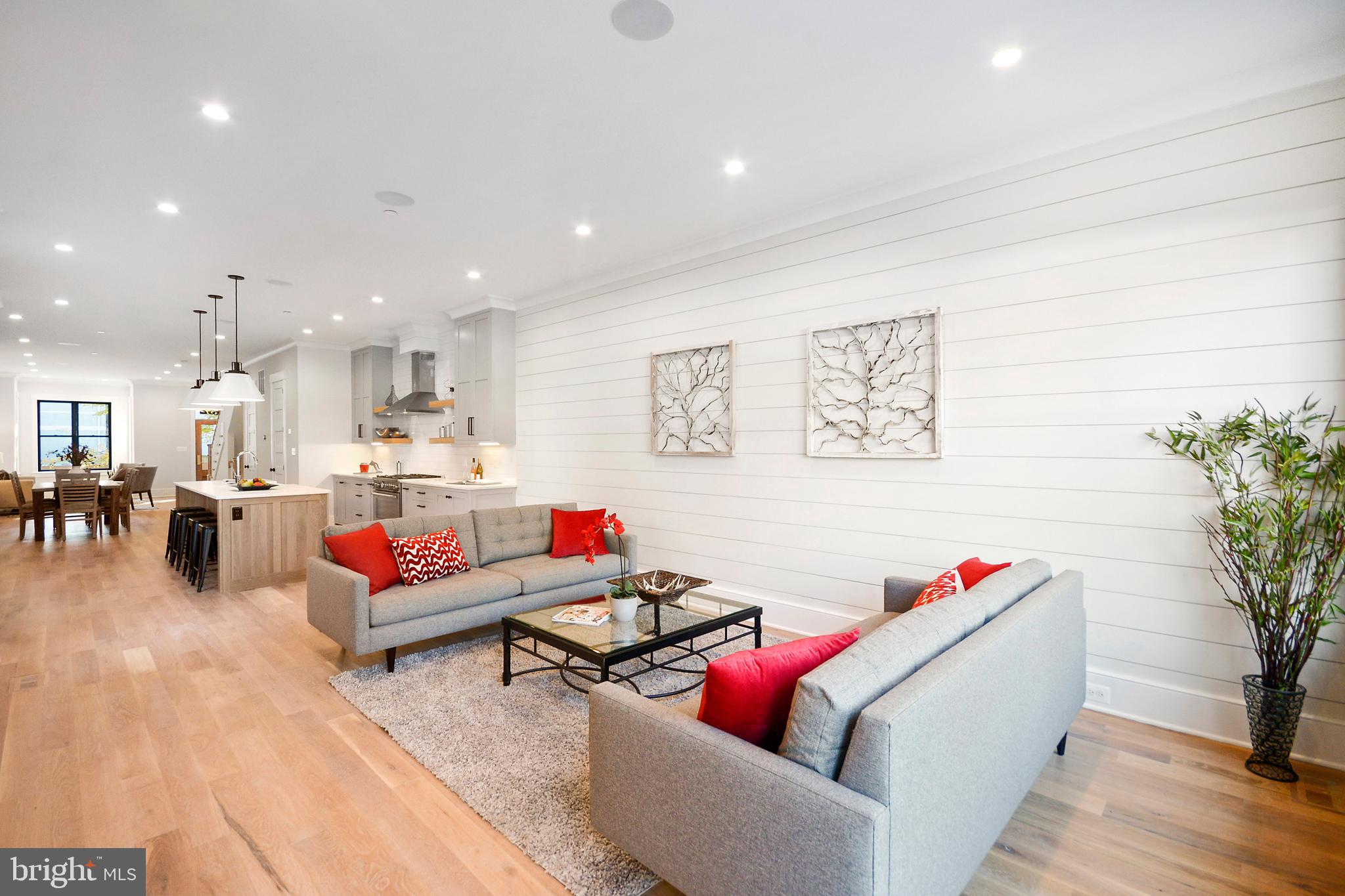 1432 G Street Southeast Washington, DC 20003 - Photo 12 of 35 a living room with furniture and flowers