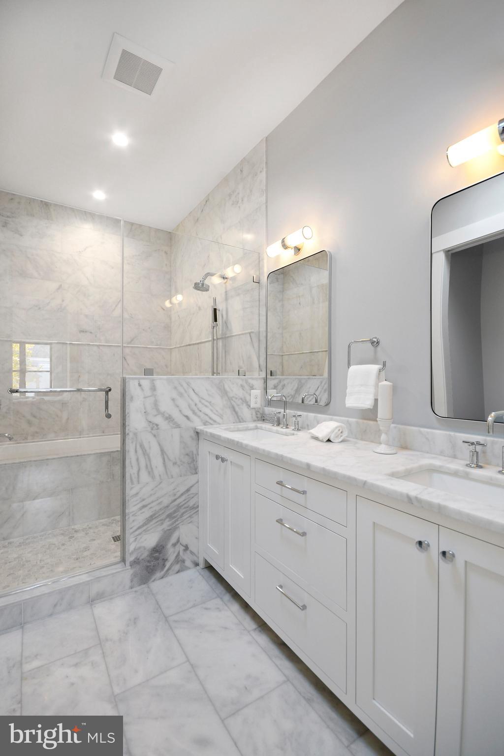 1432 G Street Southeast Washington, DC 20003 - Photo 16 of 35 a bathroom with a sink and a mirror