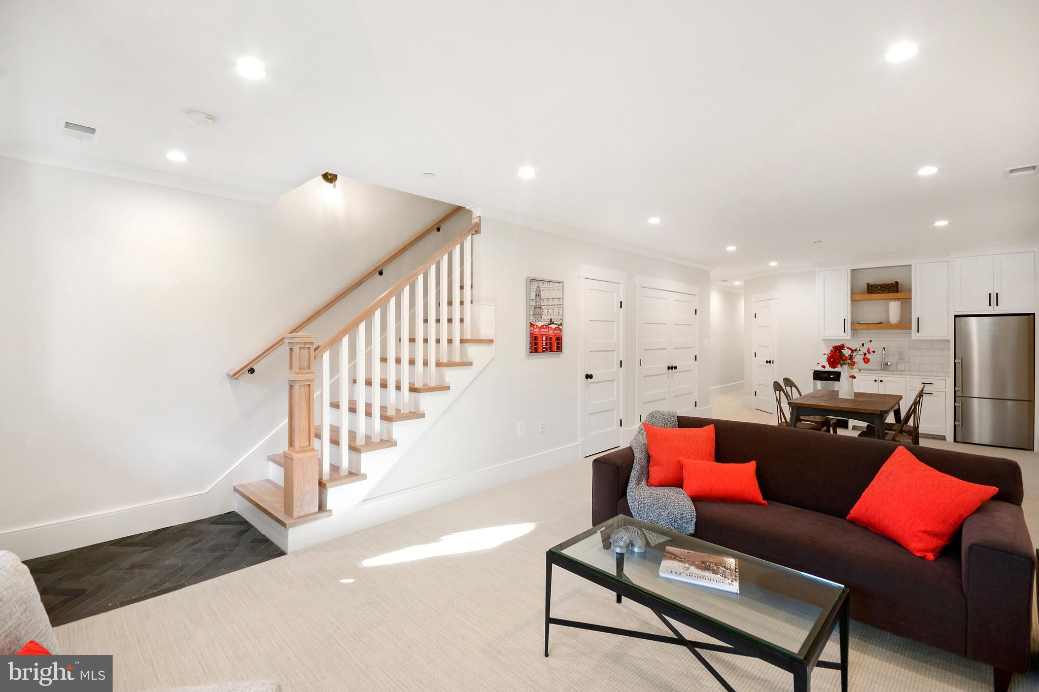 1432 G Street Southeast Washington, DC 20003 - Photo 22 of 35 a living room with furniture and kitchen view