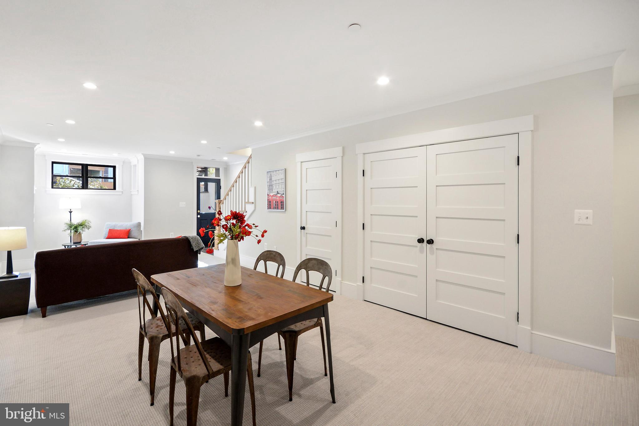 1432 G Street Southeast Washington, DC 20003 - Photo 23 of 35 a living room with furniture and a table