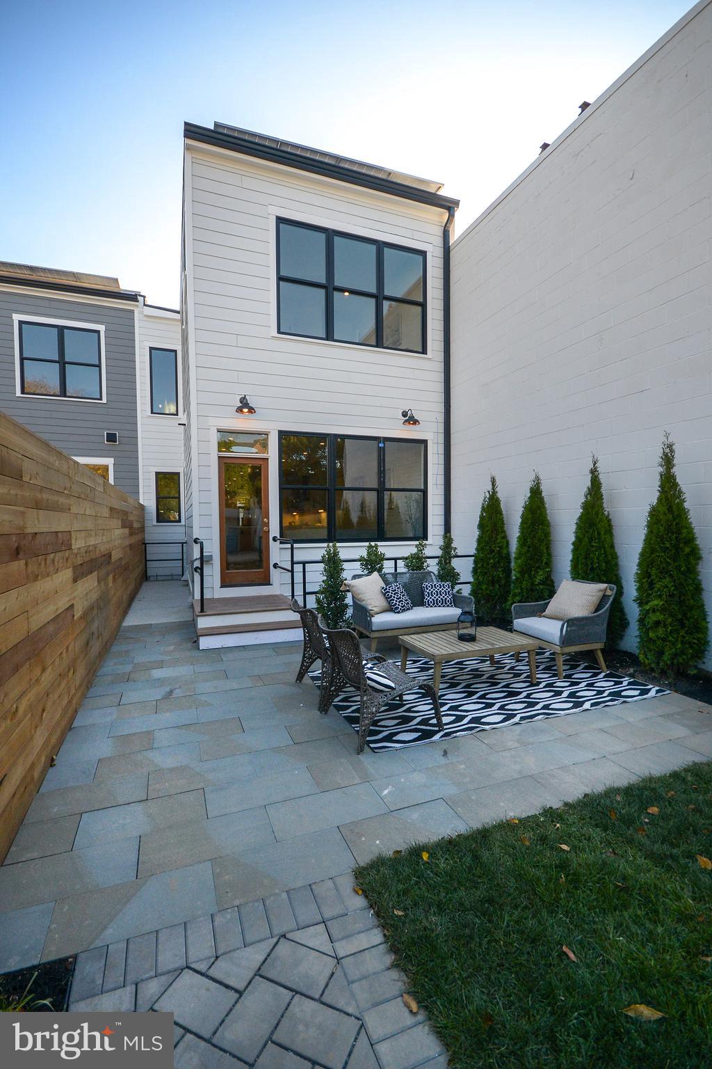 1432 G Street Southeast Washington, DC 20003 - Photo 29 of 35 a view of a house with backyard and sitting area