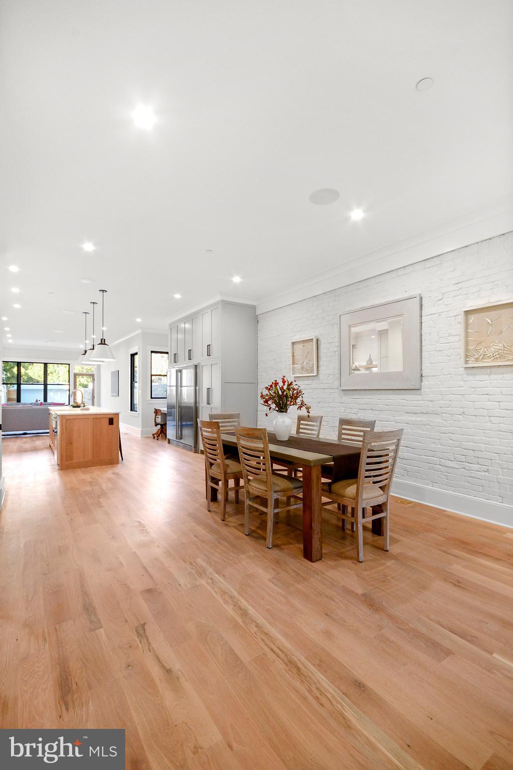 1432 G Street Southeast Washington, DC 20003 - Photo 4 of 35 a view of a dining room with furniture and wooden floor