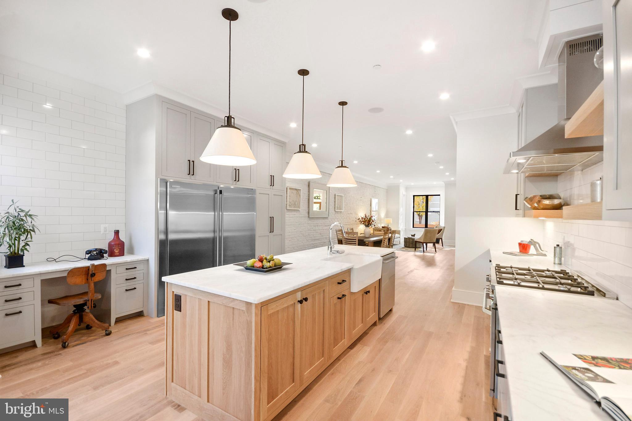 1432 G Street Southeast Washington, DC 20003 - Photo 8 of 35 a large kitchen with lots of counter space
