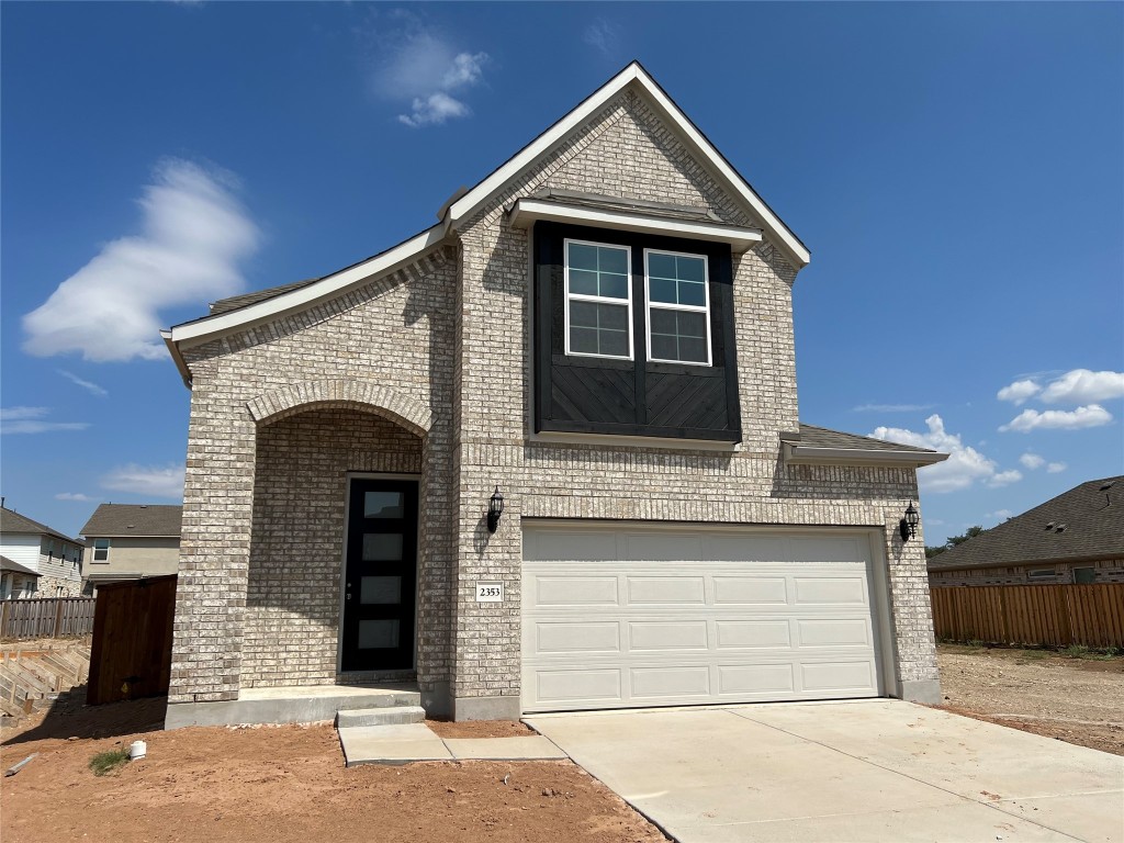 2353 Sawdust Drive Georgetown, TX 78633 - Photo 1 of 1 a front view of a house with garage
