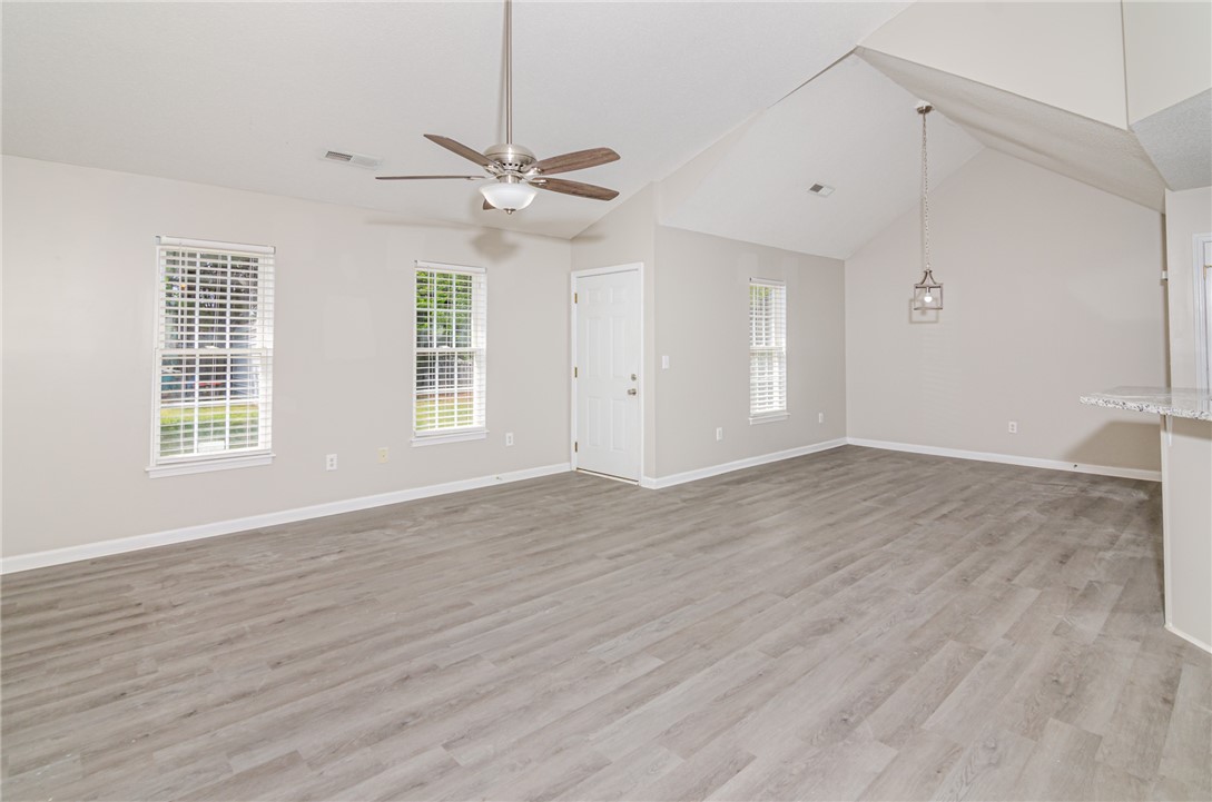 102 Hawk Ridge Drive Anderson, SC 29621 - Photo 38 of 38 This living area features a bright and open floorplan with vaulted ceilings.
