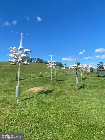 a view of a dinning table and chairs in the patio