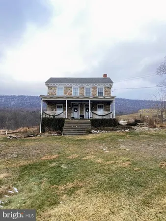 a view of yard covered with snow
