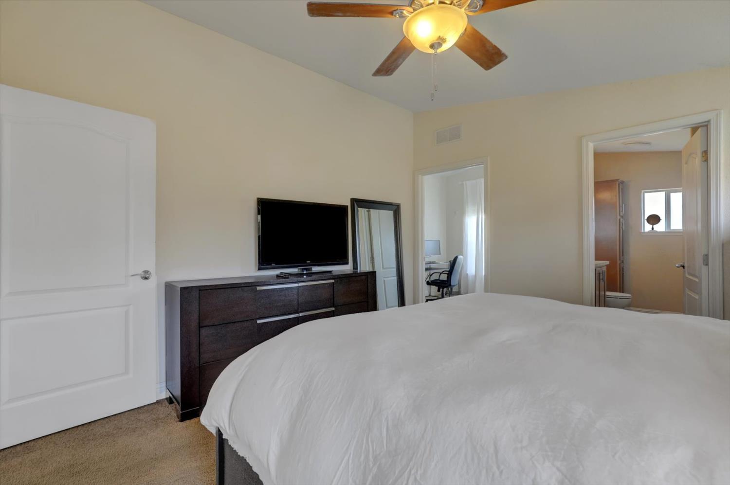13886 Meadow Valley Road Dobbins, CA 95935 - Photo 21 of 99 a bedroom with a bed and a flat screen tv