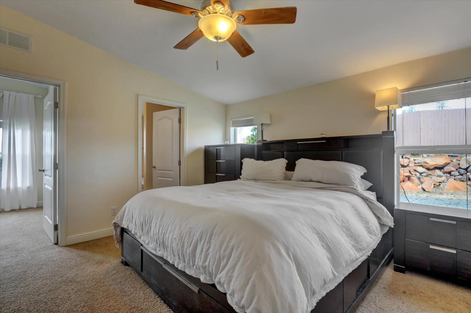 13886 Meadow Valley Road Dobbins, CA 95935 - Photo 25 of 99 a bedroom with a bed and window