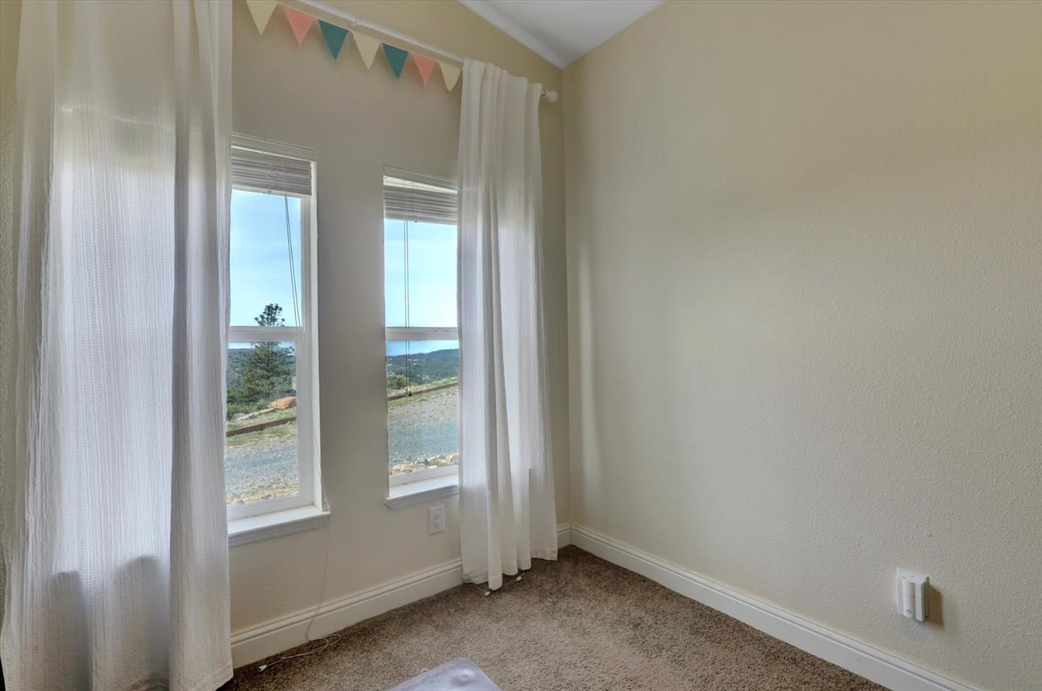 13886 Meadow Valley Road Dobbins, CA 95935 - Photo 27 of 99 a view of an empty room with window