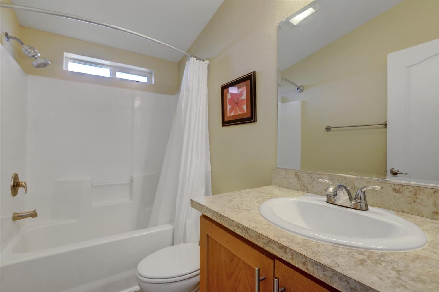 13886 Meadow Valley Road Dobbins, CA 95935 - Photo 37 of 99 a bathroom with a granite countertop sink toilet and shower