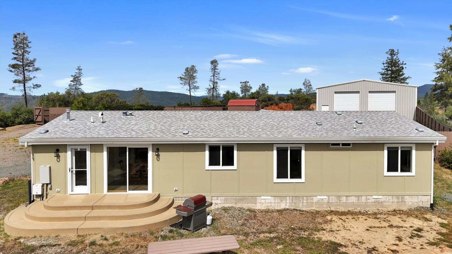 13886 Meadow Valley Road Dobbins, CA 95935 - Photo 66 of 99 a front view of a house with a yard