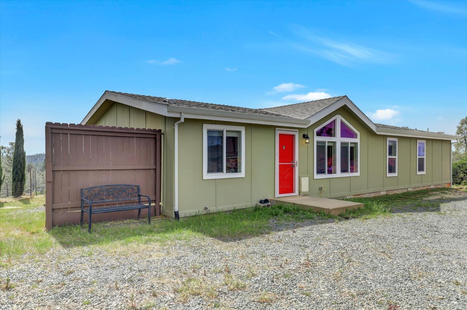 13886 Meadow Valley Road Dobbins, CA 95935 - Photo 80 of 99 a front view of a house with a yard