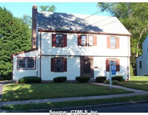 48 Hazelmere Road New Britain, CT 06053 - Photo 1 of 1 front view of house with a yard