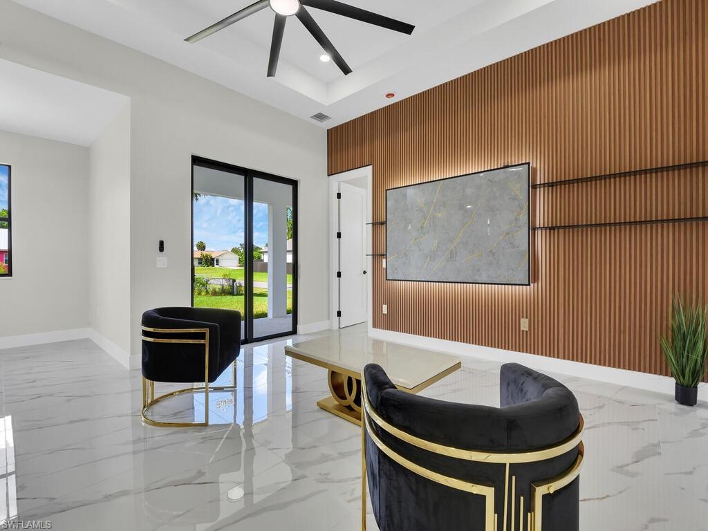 Common area with wood walls and recessed lighting