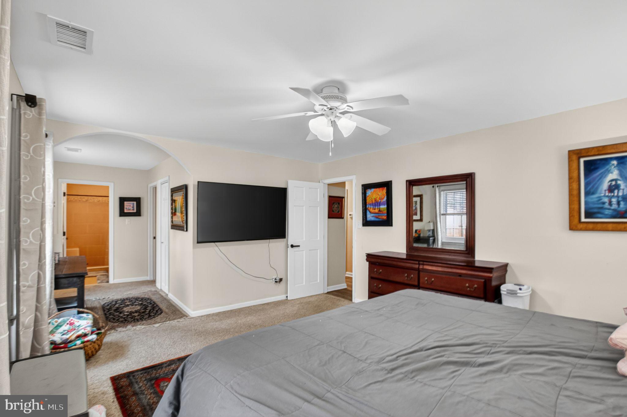 615 Clarks Run Road La Plata, MD 20646 - Photo 15 of 47 a bedroom with a bed and a flat screen tv