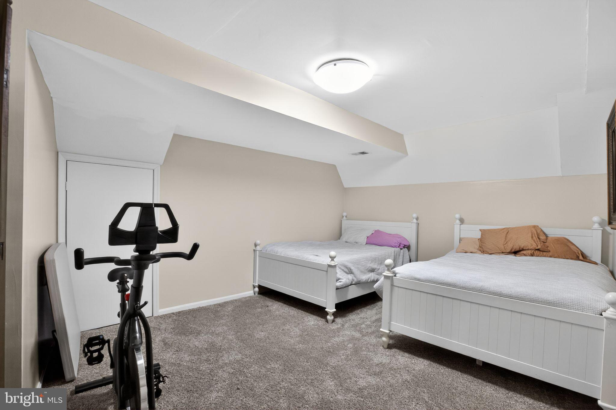 615 Clarks Run Road La Plata, MD 20646 - Photo 24 of 47 a bedroom with a bed and gym equipment