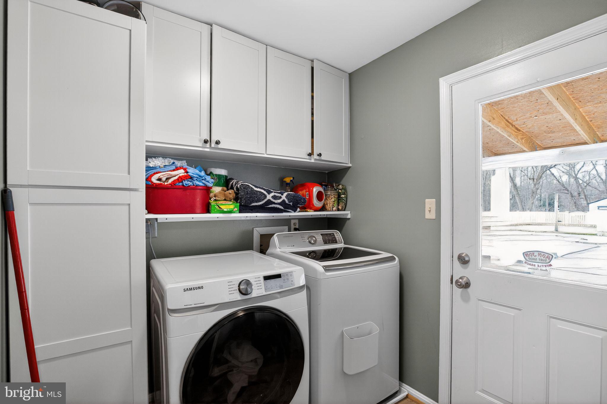 615 Clarks Run Road La Plata, MD 20646 - Photo 25 of 47 a utility room with dryer washer and a fridge
