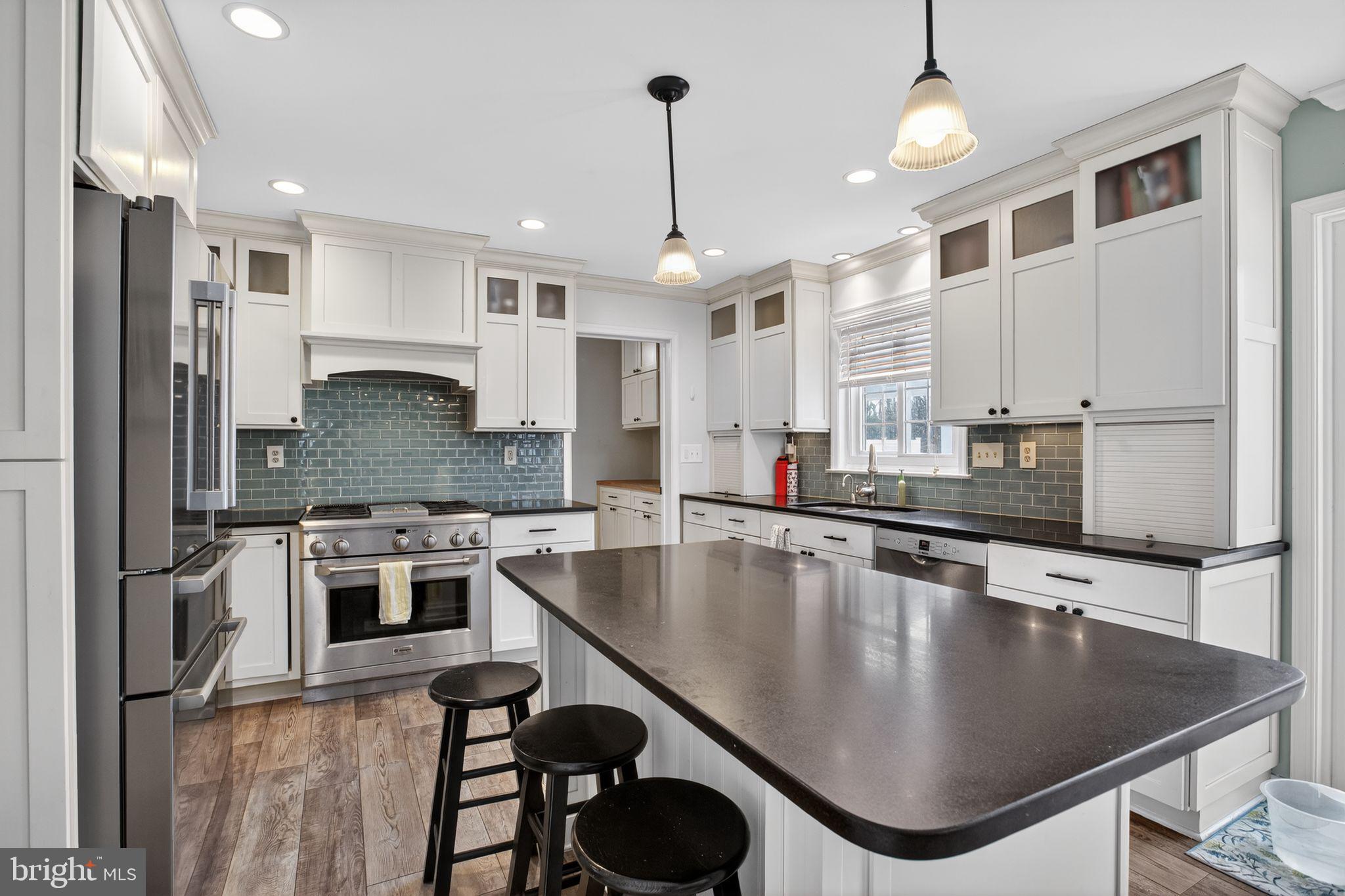 615 Clarks Run Road La Plata, MD 20646 - Photo 3 of 47 a large kitchen with stainless steel appliances granite countertop a sink a stove and a refrigerator