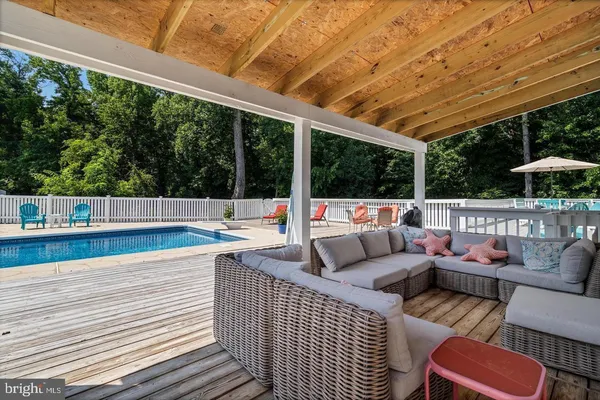 a outdoor living space with furniture and garden view