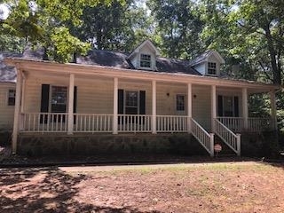 2595 Jonesboro Road Hampton, GA 30228 - Photo 1 of 1 front view of a house with a yard