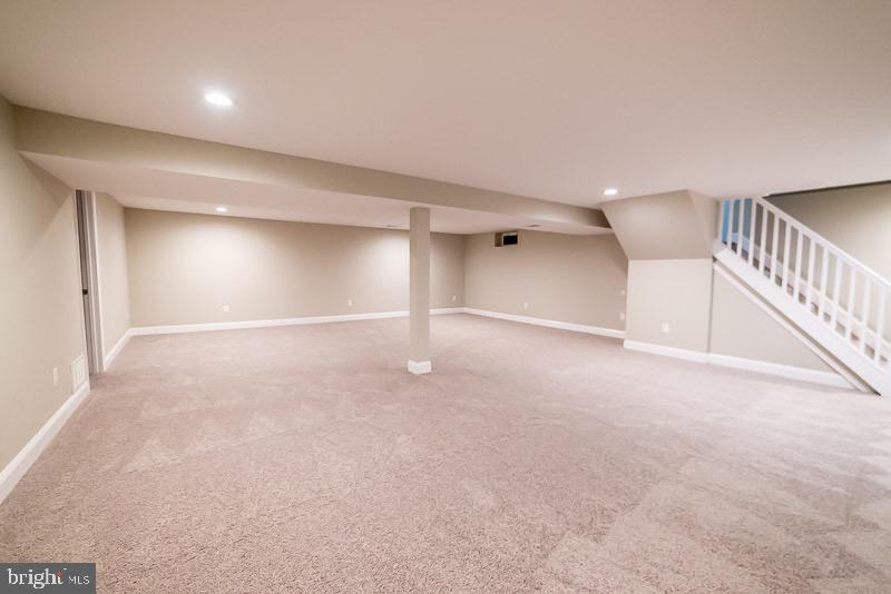 3208 Greenmead Road Baltimore, MD 21244 - Photo 18 of 19 a view of an empty room with stairs